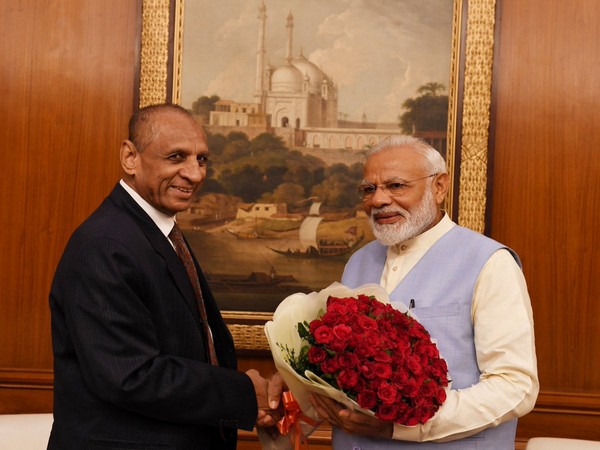 Prime Minsiter Narendra Modi with Andhra Pradesh Governor ESL Narasimhan in New Delhi on Friday. 