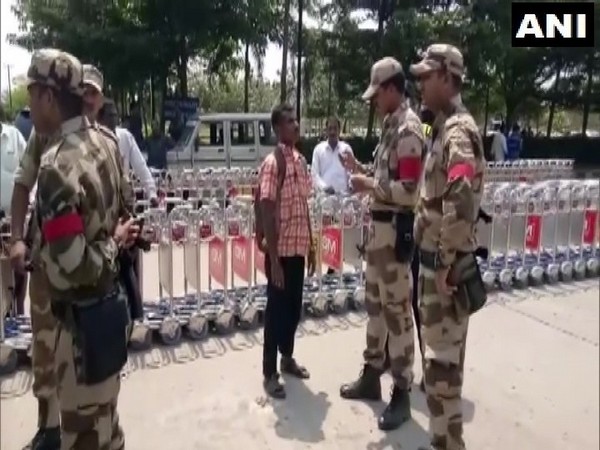 CISF personnel with accused Lova Raju. Photo/ANI