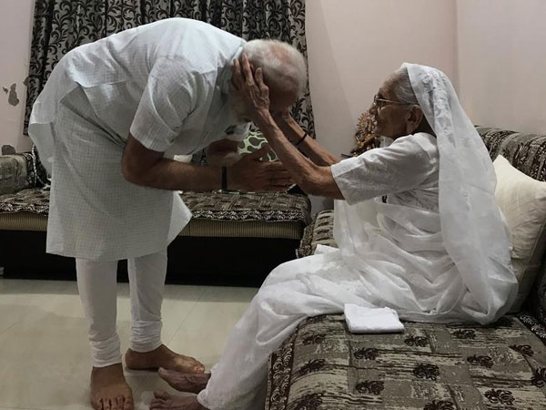 Prime Minister Narendra Modi meets his mother Heeraben Modi at her residence in Gandhinagar
