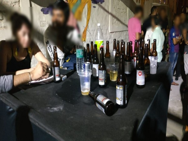 A large amount of drugs and foreign liquor was seized in the raid in Chhbarapur, New Delhi, on Saturday night. (Photo/ANI)