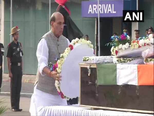 Union Defence Minister Rajnath Singh paid tribute to deceased Army jawan Lance Naik Mohammad Jawed in New Delhi on Tuesday. Photo/ANI