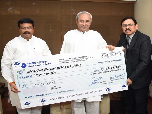 Union Minister Dharmendra Pradhan & Anil Kumar Chaudhary, SAIL Chairman hand over Rs 3 crore cheque to Odisha CM Naveen Patnaik