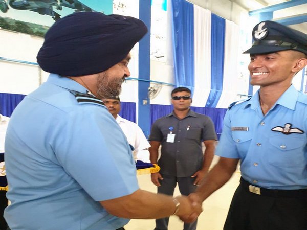 IAF Chief BS Dhanoa greets Flying Officer Navin Reddy, winner of 'Sword of Honour' 