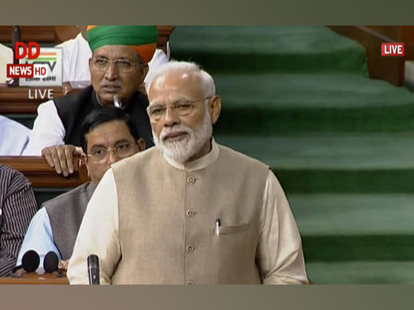 Prime Minister Narendra Modi speaking in the Lok Sabha on Wednesday.  (Courtesy: LSTV)