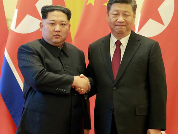 North Korean leader Kim Jong-un with Chinese President Xi Jinping