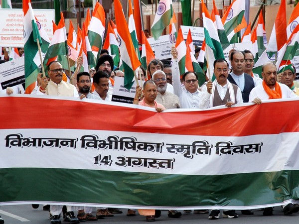 Uttar Pradesh Chief Minister Yogi Adityanath participates in a silent march (Photo/ANI)