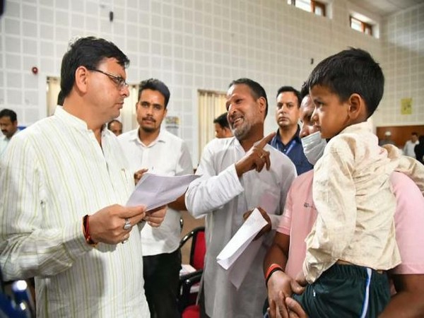 Uttarakhand Chief Minister Pushkar Singh Dhami meets locals (Photo/ANI)