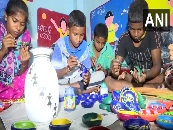 Visual of the children making Earthern lamps (Photo/ANI) 