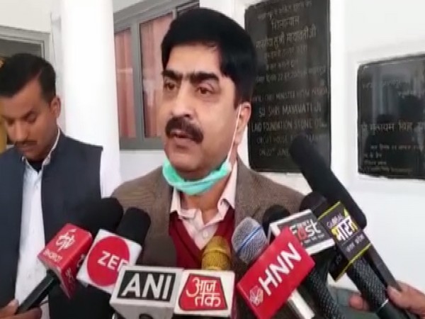 Saharanpur District Magistrate Akhilesh Singh talking to reporters on Wednesday.