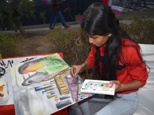 A young artist participating in the painting competition on Thursday at Rajiv Chowk. Photo/ANI