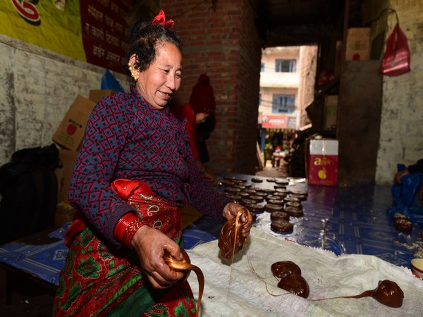 People preparing molasses in Kathmandu as the season kicks in. Photo/ANI