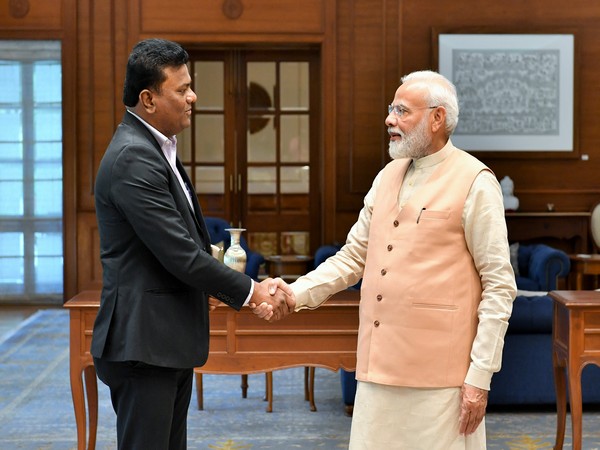 Prime Minister Narendra Modi with Captain Amol Yadav in New Delhi on Sunday. Photo/ANI