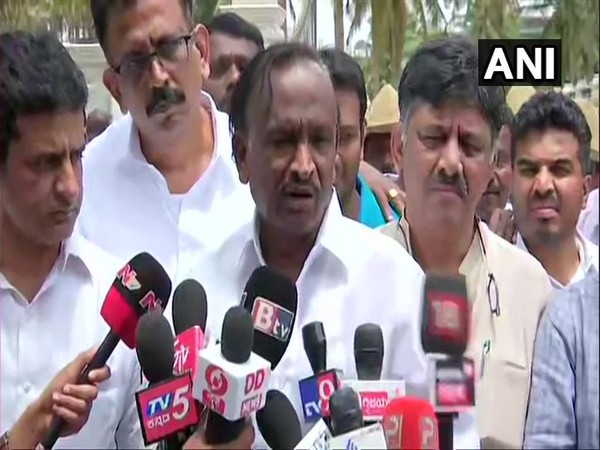 Congress rebel MTB Nagraj with senior party leader DK Shivakumar in Bengaluru on Saturday. Photo/ANI