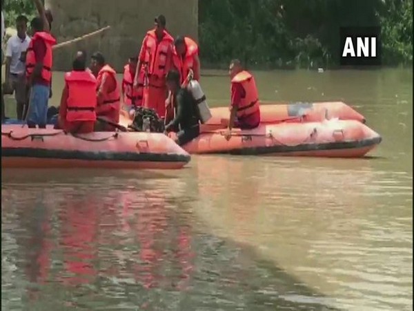 Rescue operation underway at Lilong Bridge in Imphal, after a car fell into a river yesterday. [Photo/ANI]