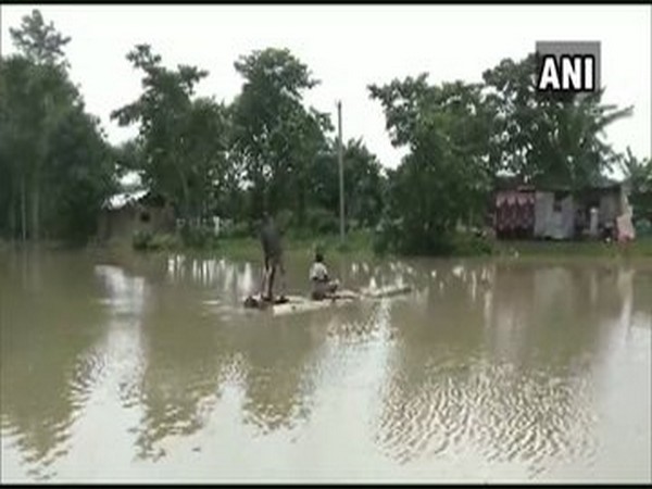 Kampur Guimari village flooded after the level of water of Brahmaputra river rises in Nagaon [Photo/ANI]