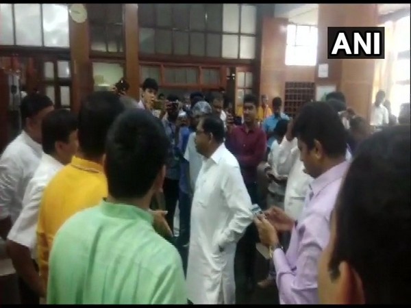 Karnataka Deputy Chief Minister G Parameshwara meets BJP MLAs on overnight protest on Friday. Photo/ANI