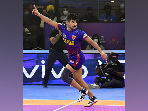 Dabang Delhi K.C raider Naveen Kumar celebrates a point against Bengaluru Bulls (Image: PKL)