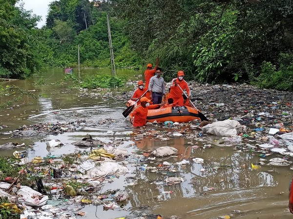 NDRF team rescues 9 people trapped in flooded ashram on the banks of Narmada river in Gujarat on Monday. (Photo: Twitter)