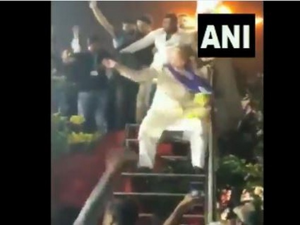 AIMIM Chief Asaduddin Owaisi performs a dance step after the end of his rally at Paithan Gate in Aurangabad. 