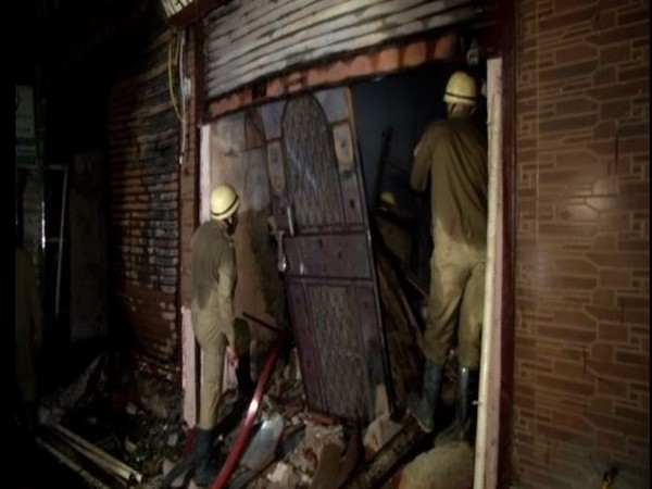 Fire department personnel at the spot in Daryaganj on Wednesday. Photo/ANI
