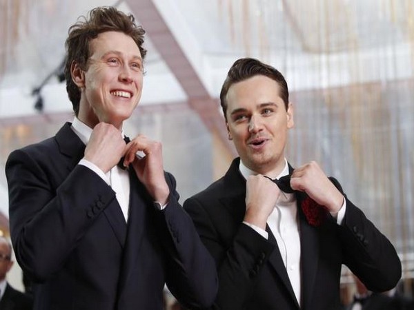 George MacKay and Dean Charles at the 92nd Oscars