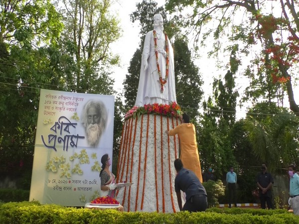 Tripura Chief Minister Biplab Kumar Deb paying floral tribute to Rabindranath Tagore in Agartala on Friday. Photo/ANI