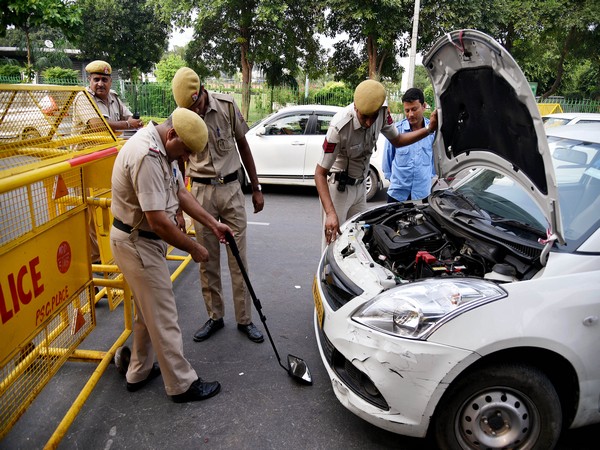 Delhi police checking a vehicle on a city road [File Photo for representation only]