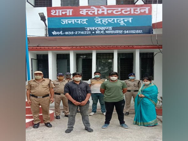 Uttarakhand BJP Mahila Morcha secretary with her sons at Clement Town police station. (Photo/ANI)