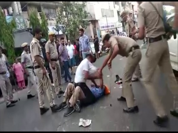 Some people personnel had allegedly thrashed an auto driver following an altercation in Mukherjee Nagar area north-west Delhi on Sunday. (Photo/ANI)