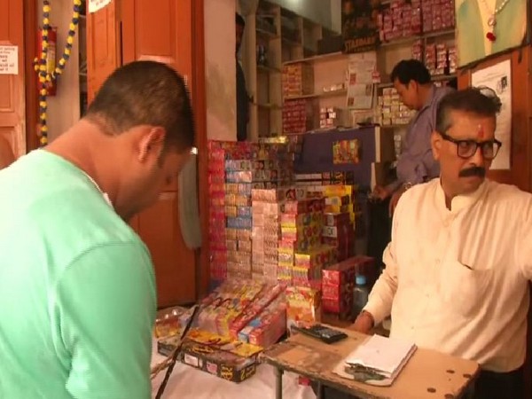 People of Delhi buying green crackers from Chandi Chowk market on Saturday. Photo/ANI