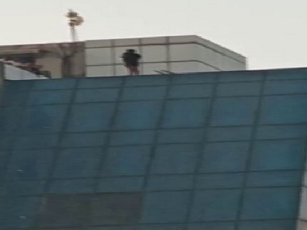 Man threatened to commit suicide (Photo/ANI)
