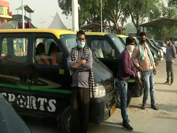 Taxi drivers at New Delhi Railway station on Tuesday. Photo/ANI