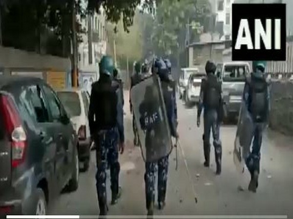 Police and Rapid Action Force (RAF) personnel hold flag march in Brahmpuri area after stone-pelting incident between two groups here on Tuesday. Photo/ANI