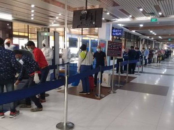 Passengers boarding Dhaka airport on Saturday for a Delhi bound flight under the Vande Bharat Mission.