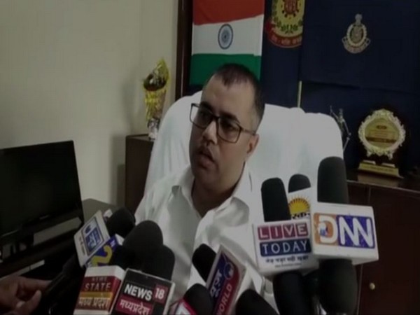 Dhar Superintendent of Police, Aditya Pratap Singh, speaking to reporters.