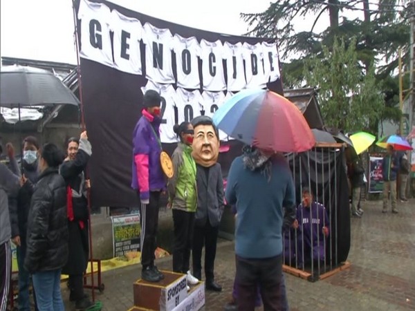 Tibetan activists staging protest in Dharamshala (Photo/ANI)