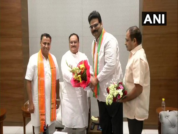 Lanka Dinakar with BJP working president JP Nadda in New Delhi.