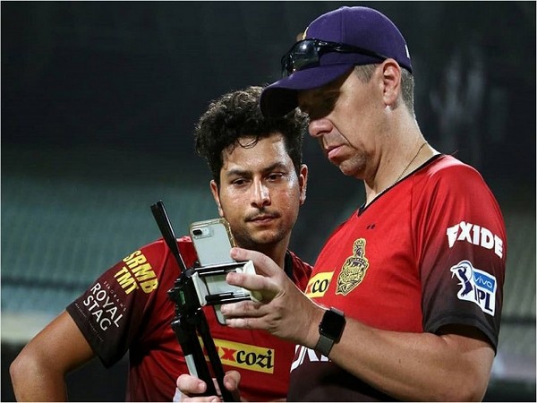 Indian spinner Kuldeep Yadav with Carl Crowe (Image: KKR)