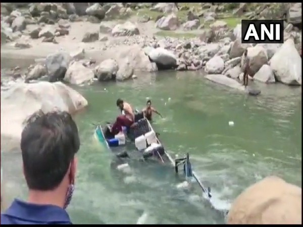 A minibus skidded off a mountainous road and fell into a river in the Doda district in Jammu and Kashmir. (Photo/ ANI)