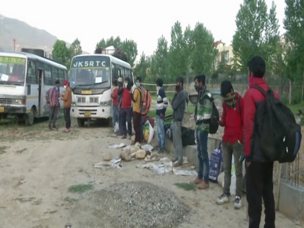 Migrant workers leaving the quarantine facility in Doda. Photo/ANI
