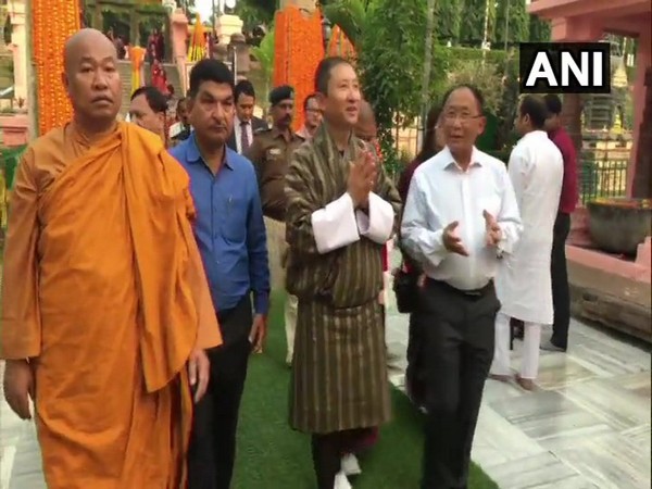 Bhutan Foreign Minister Tandi Dorji (C) at the Mahabodhi Temple in Bodh Gaya on Tuesday.