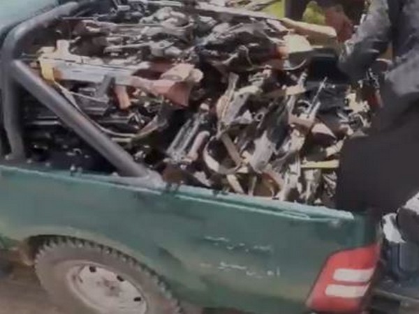 Taliban ransacking Abdul Rashid Dostum house and looting his arms (ANI)