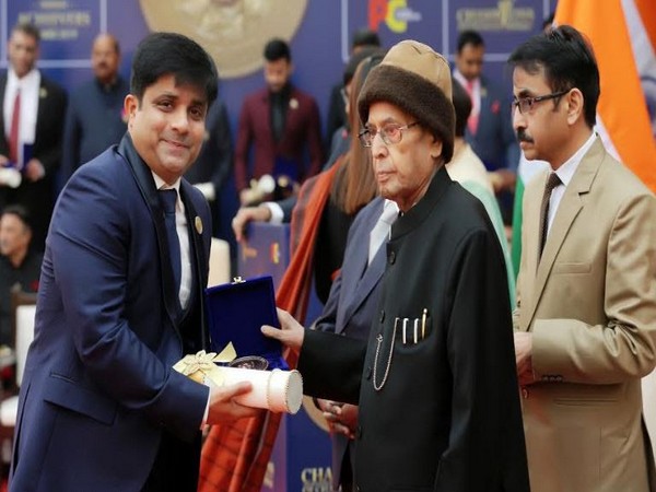 Dr Beerinder Singh Yogi receiving his award from Dr Pranab Mukherjee