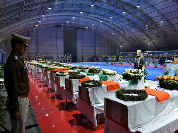 Prime Minister Narendra Modi paying tribute to the mortal remains of the CRPF jawans (Picture tweeted by PM Modi on Feb 15, 2019) 