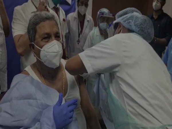 Former Karnataka CM Siddaramaiah receiving second dose of COVID-19 vaccine (Photo/ANI)