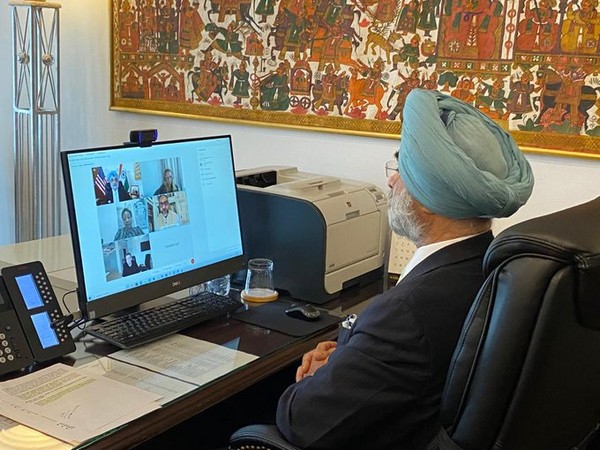 Indian Ambassador to US Taranjit Singh Sandhu interacting with Pfizer CEO Albert Bouria (Credit: Taranjit Singh Sandhu/Twitter)