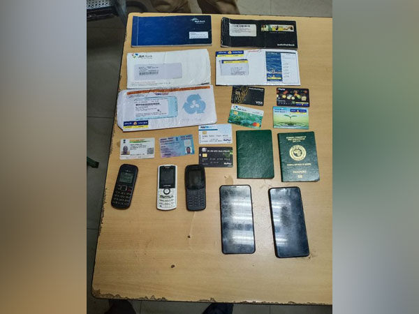 Police recovered five mobile phones, six ATM cards and five cheque books from the Nigerian national on Friday. [Photo/ANI]