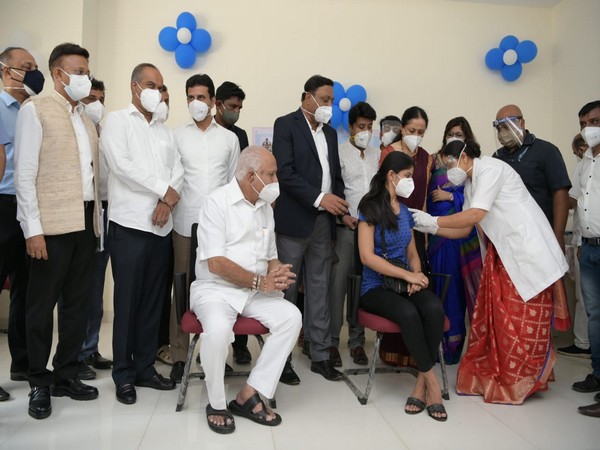 A girl being vaccinated in front of Chief Minister BS Yediyurappa at Bowring and Lady Curzon Hospital in Bengaluru on Saturday. (Photo/ANI)