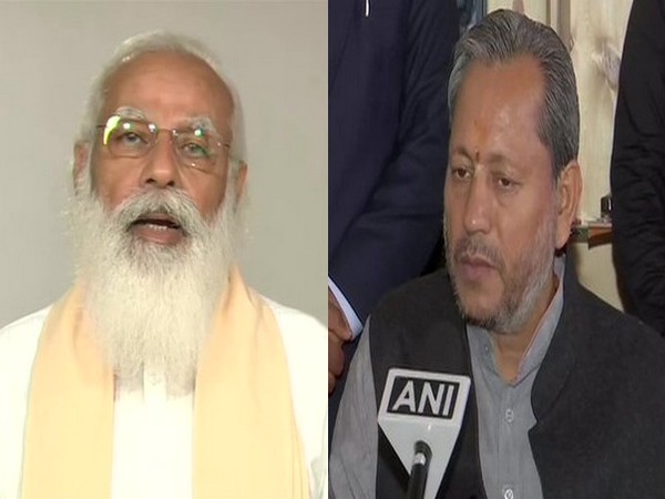 Prime Minister Narendra Modi (left) Uttarakhand Chief Minister Tirath Singh Rawat (right). (File photo)