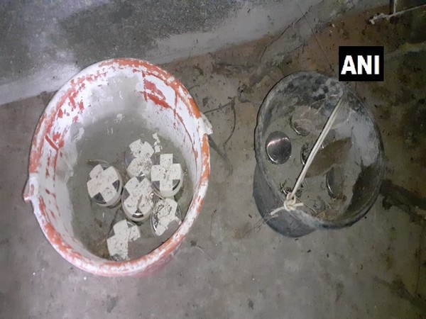 Crude bombs recovered fron two buckets in North 24 Parganas district on Monday. (Photo/ANI)